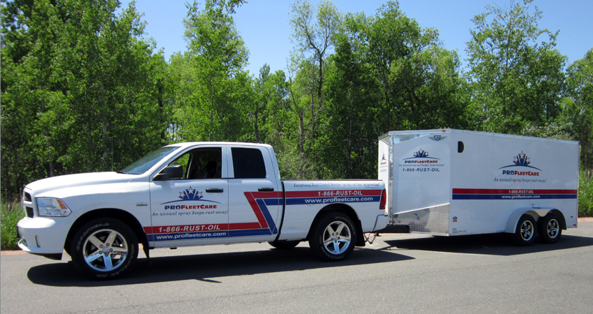 Pro Fleet Care branded pickup truck and mobile service trailer
